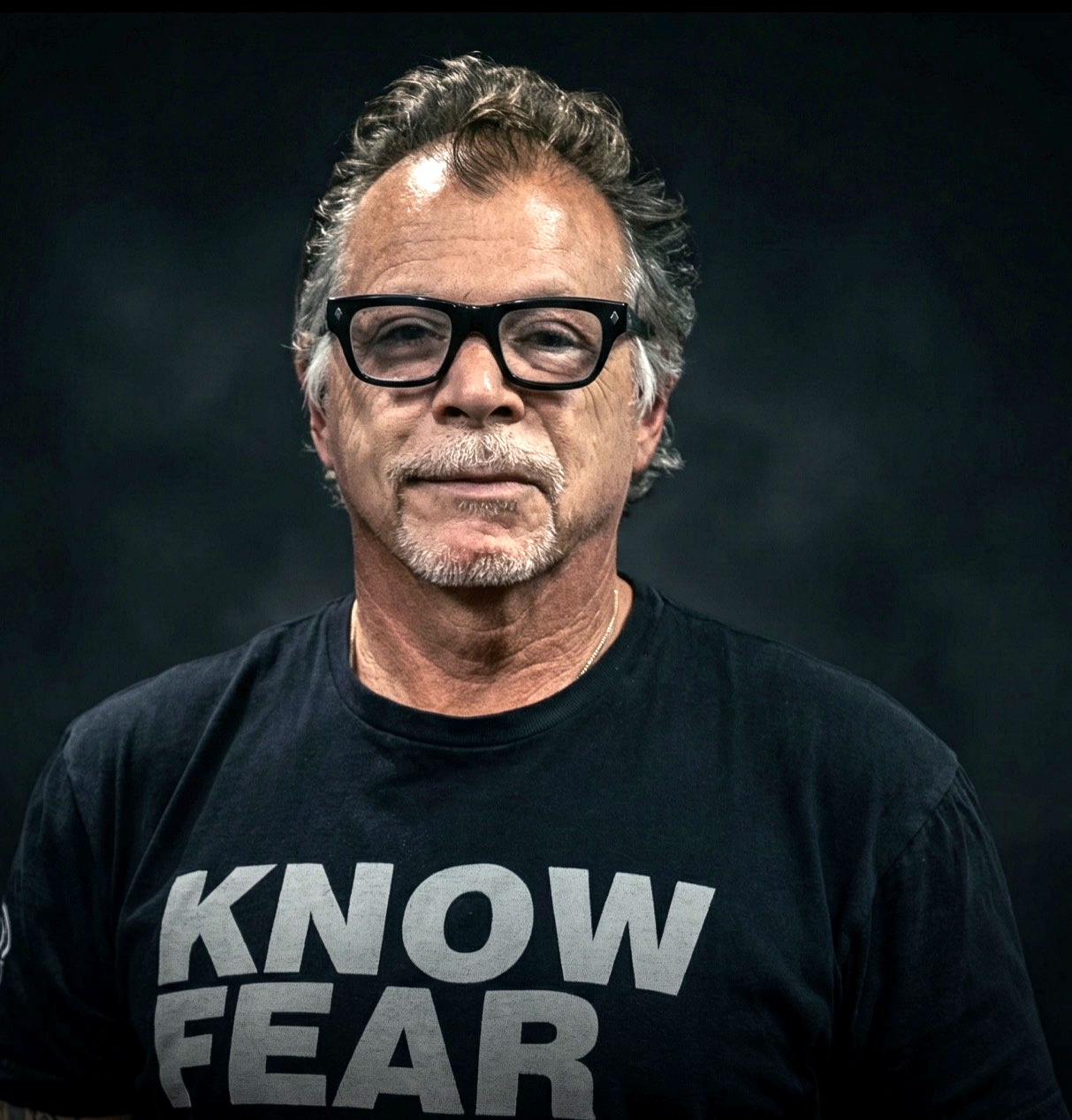 Tony Blauer wearing a Know Fear shirt